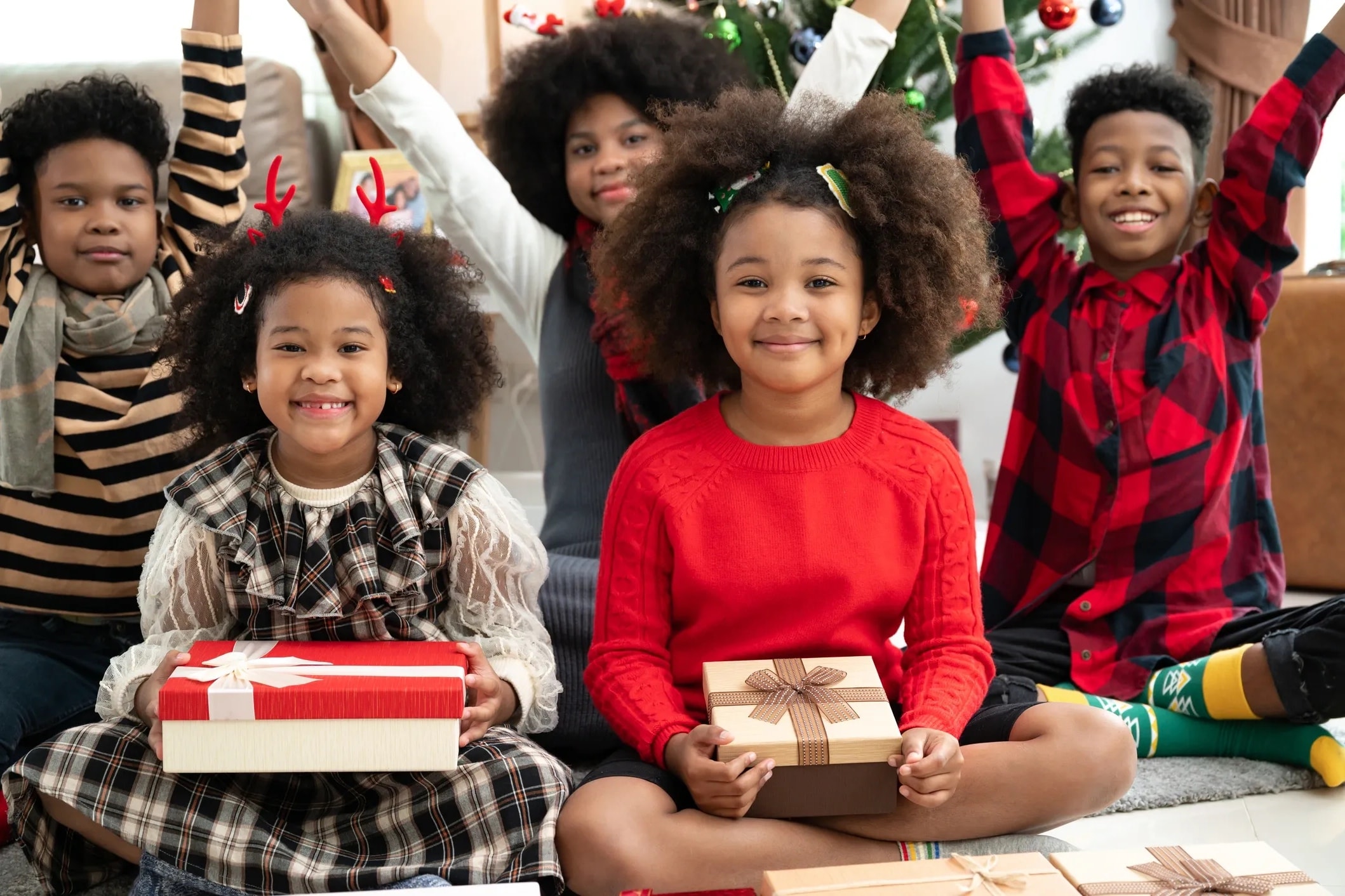 Families celebrating the holiday season with gifts and joy